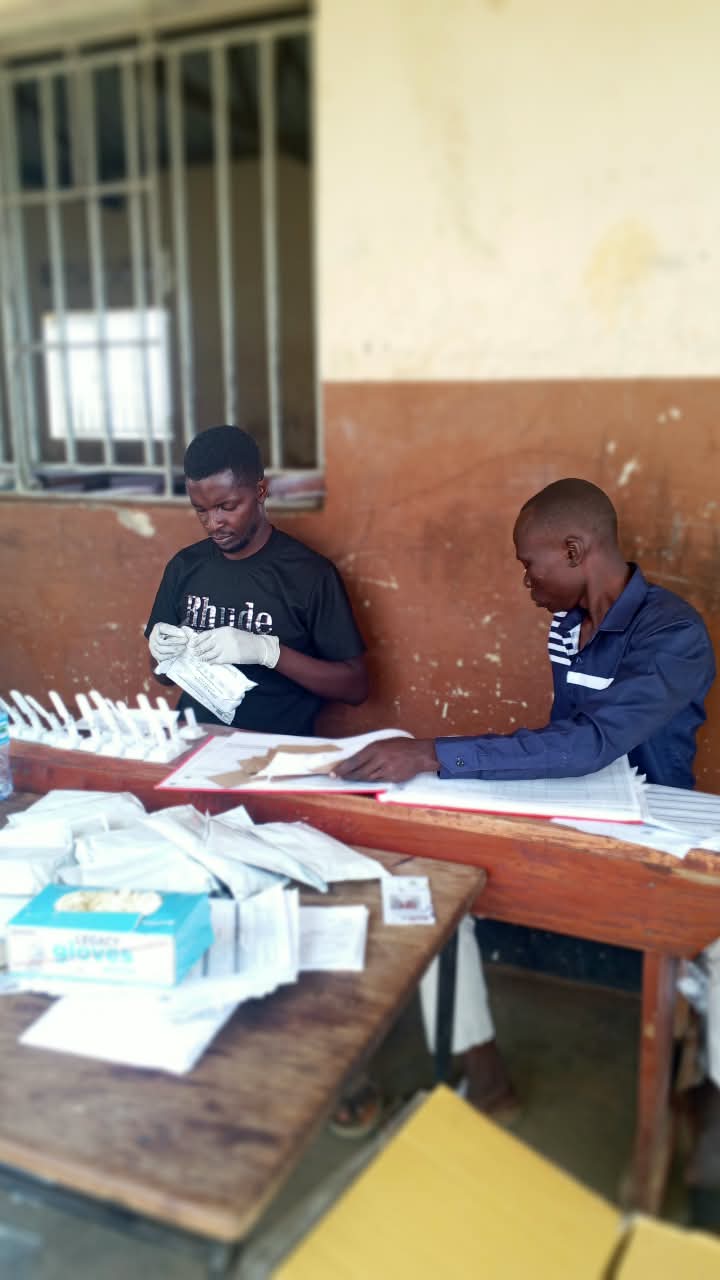 Health workers preparing testing materials