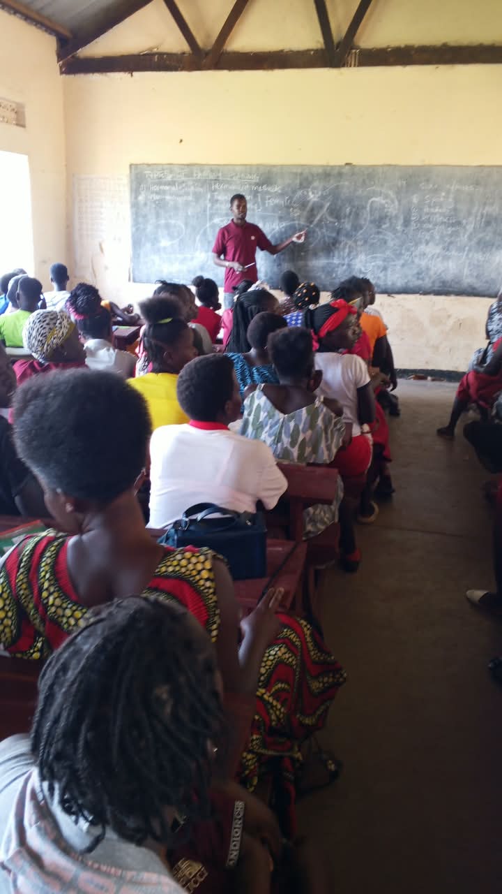 Indoor classroom session with many young people