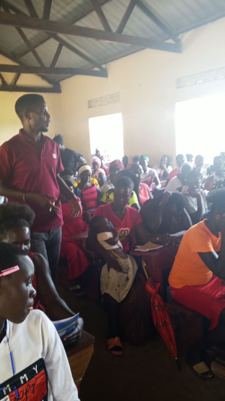 Large indoor health education session for young parents