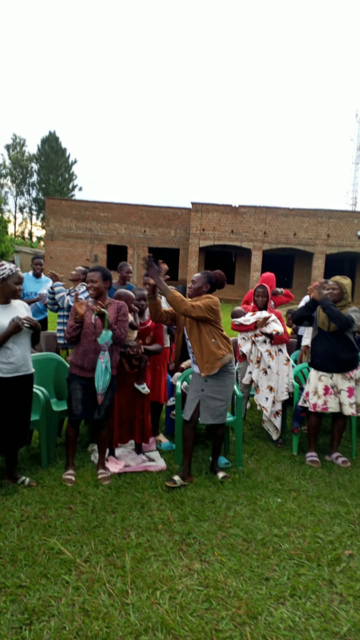 Health educator teaching a full classroom of young parents