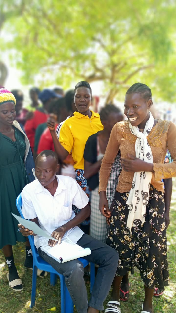 Health worker registering young mothers at an outreach session